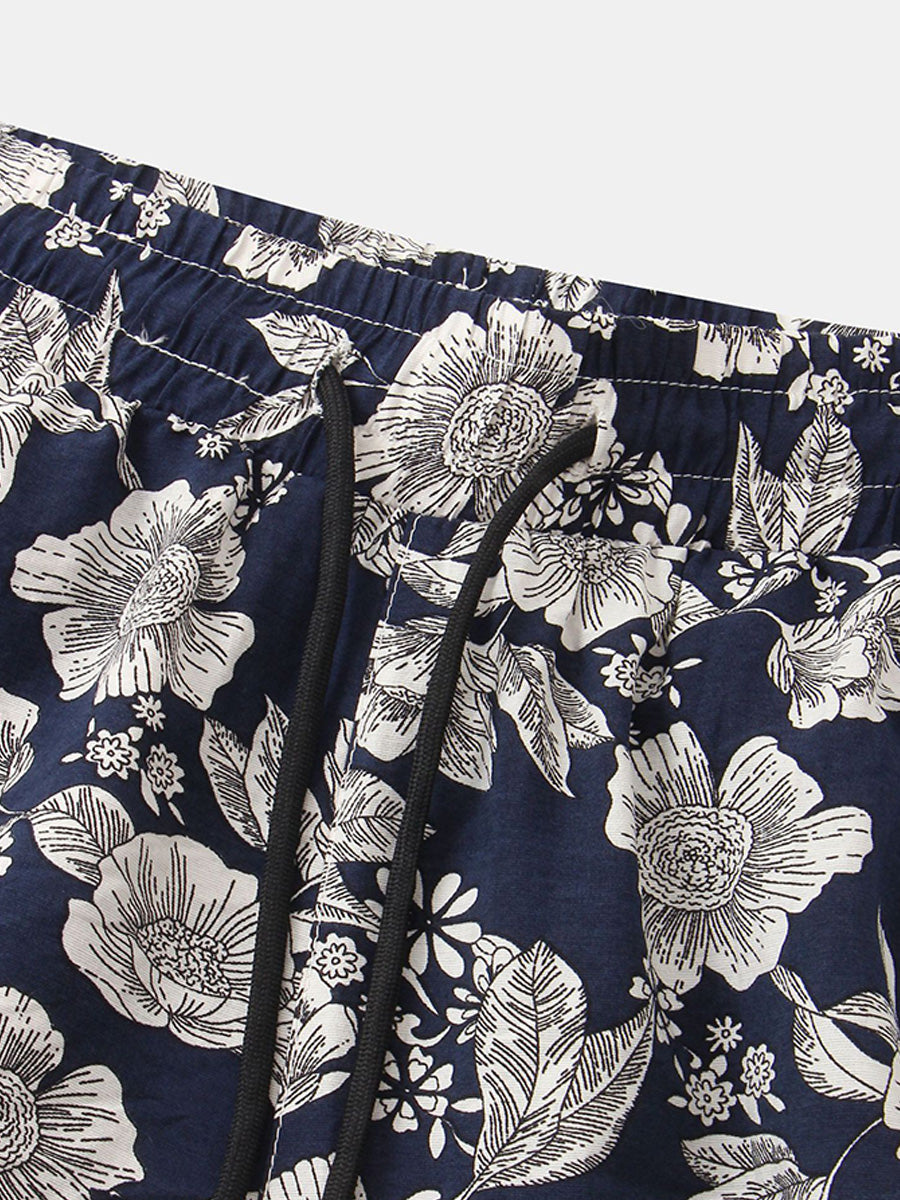Completo da uomo con camicia e pantaloncini con stampa floreale